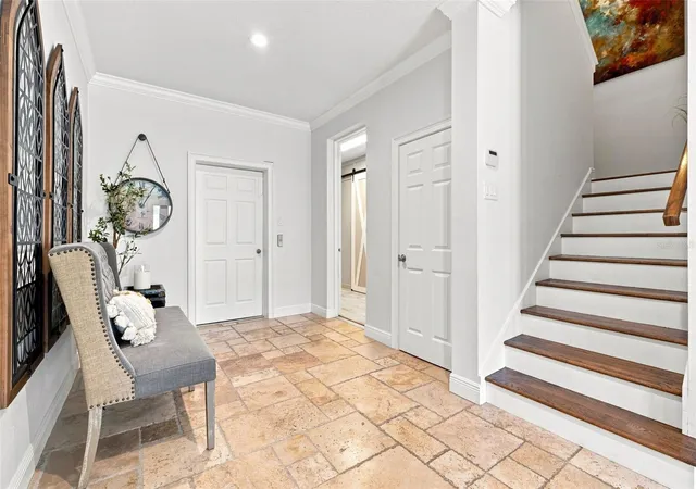 Photo 4 of Single family home for sale at 116 Forest Hills Dr, Saint Petersburg, FL 33708 | MLS# TB8547332 | Listing updated on 2026-09-23