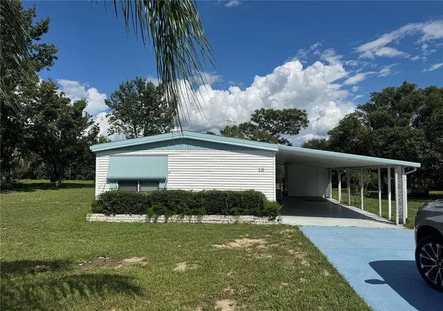 Photo 2 of Manufactured home for sale at 18 Bradford Blvd, Frostproof, FL 33843 | MLS# K4903776 | Listing updated on 2026-09-24