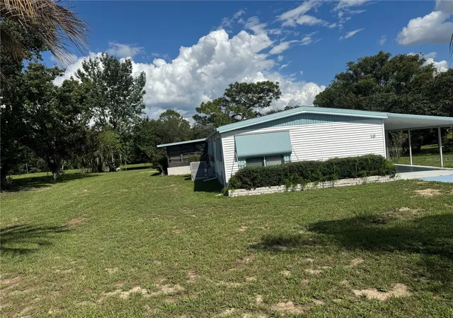 Photo 3 of Manufactured home for sale at 18 Bradford Blvd, Frostproof, FL 33843 | MLS# K4903776 | Listing updated on 2026-09-24