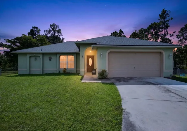 Photo 1 of Single family home for sale at 1048 Bandera St, Lehigh Acres, FL 33974 | MLS# TB8547386 | Listing updated on 2026-09-14
