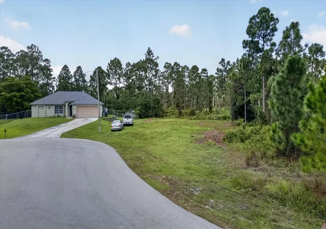 Photo 47 of Single family home for sale at 1048 Bandera St, Lehigh Acres, FL 33974 | MLS# TB8547386 | Listing updated on 2026-09-14