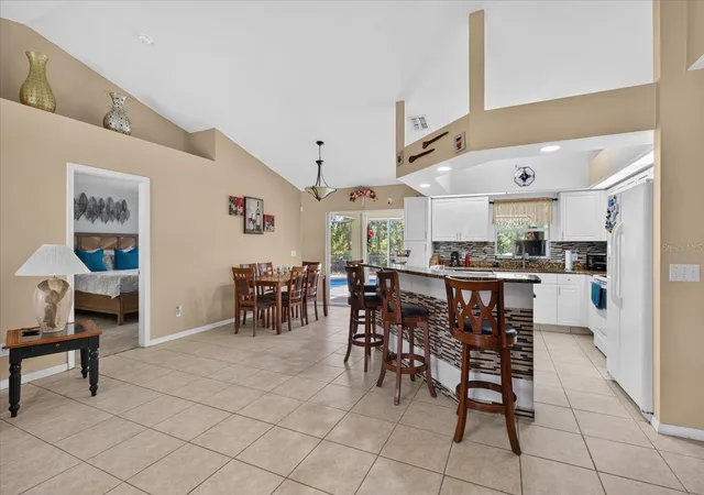 Photo 4 of Single family home for sale at 1048 Bandera St, Lehigh Acres, FL 33974 | MLS# TB8547386 | Listing updated on 2026-09-14