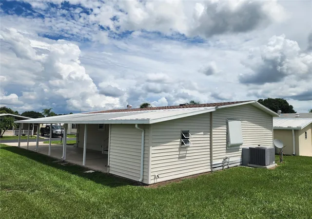 Photo 2 of Manufactured home for sale at 97 Parson Dr, Winter Haven, FL 33884 | MLS# G5117624 | Listing updated on 2026-09-15