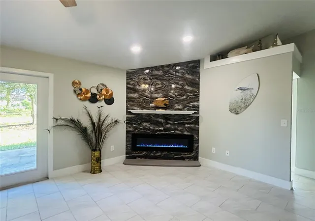 Photo 3 of Single family home for sale at 9709 SE Sunset Harbor Rd, Summerfield, FL 34491 | MLS# TB8547410 | Listing updated on 2026-09-23
