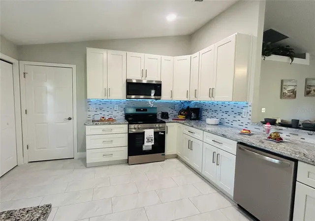 Photo 4 of Single family home for sale at 9709 SE Sunset Harbor Rd, Summerfield, FL 34491 | MLS# TB8547410 | Listing updated on 2026-09-23