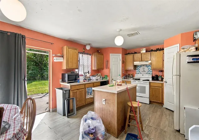 Photo 3 of Single family home for sale at 1027 Ronlin St, Haines City, FL 33844 | MLS# O6440815 | Listing updated on 2026-10-08