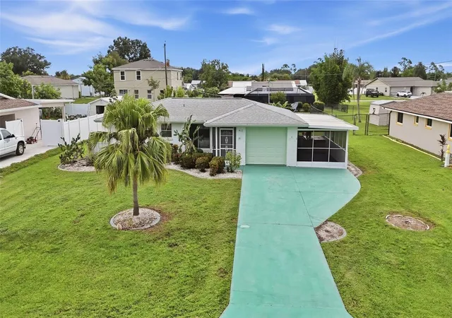 Photo 2 of Single family home for sale at 418 Cypress Ave Nw, Port Charlotte, FL 33952 | MLS# C7530608 | Listing updated on 2026-09-15
