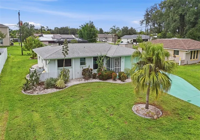 Photo 2 of Single family home for sale at 418 Cypress Ave NW, Port Charlotte, FL 33952 | MLS# C7530608 | Listing updated on 2026-09-15