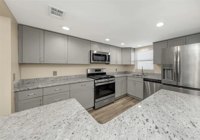 Listing Photo 1 - Condo for sale in building located at 1868 Shore Dr S, SOUTH PASADENA, FL 33707 - Unit #409