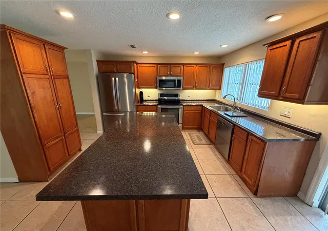 Photo 4 of Single family home for sale at 1631 Lema Dr, Titusville, FL 32780 | MLS# O6440861 | Listing updated on 2026-09-19