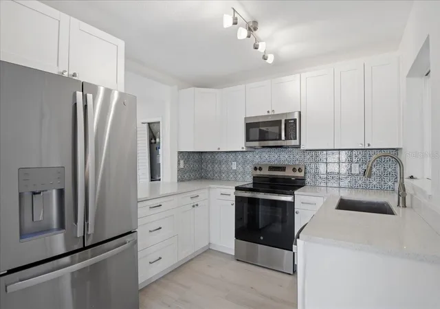 Photo 1 of Single family home for sale at 548 Baywood Dr S, Dunedin, FL 34698 | MLS# TB8547502 | Listing updated on 2026-10-02
