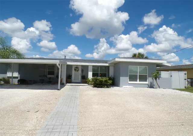 Photo 2 of Single family home for sale at 861 Conreid Dr Ne, Port Charlotte, FL 33952 | MLS# K4903778 | Listing updated on 2026-10-13