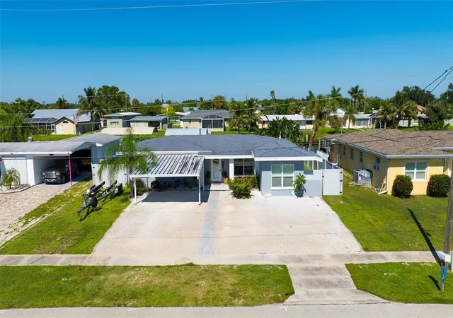 Photo 1 of Single family home for sale at 861 Conreid Dr Ne, Port Charlotte, FL 33952 | MLS# K4903778 | Listing updated on 2026-10-13