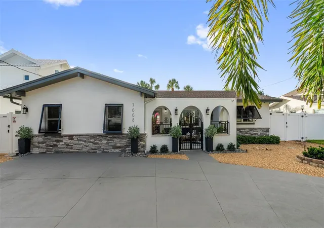 Photo 2 of Single family home for sale at 7008 S Shore Dr, South Pasadena, FL 33707 | MLS# TB8547512 | Listing updated on 2026-09-12