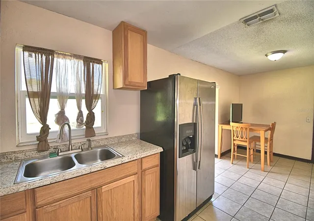 Photo 3 of Single family home for sale at 2407 Lilly St, Lake Wales, FL 33898 | MLS# O6440885 | Listing updated on 2026-10-03
