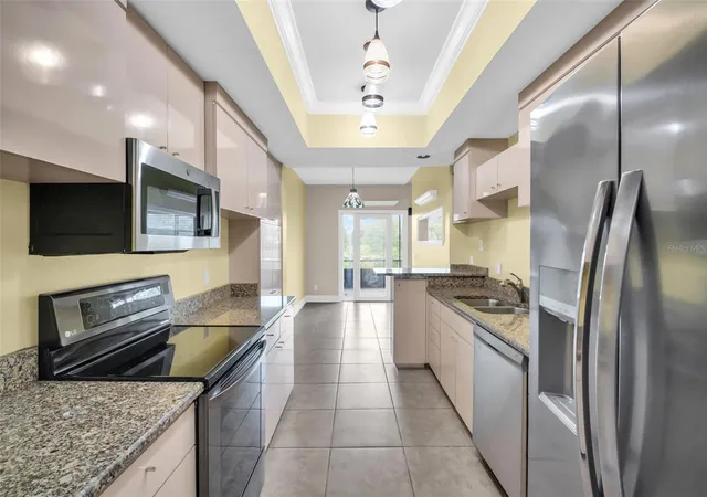Photo 3 of Townhouse for sale at 9723 Tiffany Oaks Ln #3B, Tampa, FL 33612 | MLS# TB8547517 | Listing updated on 2026-10-03