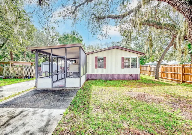 Photo 2 of Manufactured home for sale at 11704 Doaks St, New Port Richey, FL 34654 | MLS# TB8547522 | Listing updated on 2026-09-14