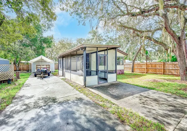 Photo 3 of Manufactured home for sale at 11704 Doaks St, New Port Richey, FL 34654 | MLS# TB8547522 | Listing updated on 2026-09-14