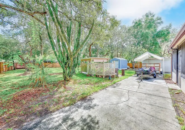 Photo 3 of Manufactured home for sale at 11704 Doaks St, New Port Richey, FL 34654 | MLS# TB8547522 | Listing updated on 2026-09-14