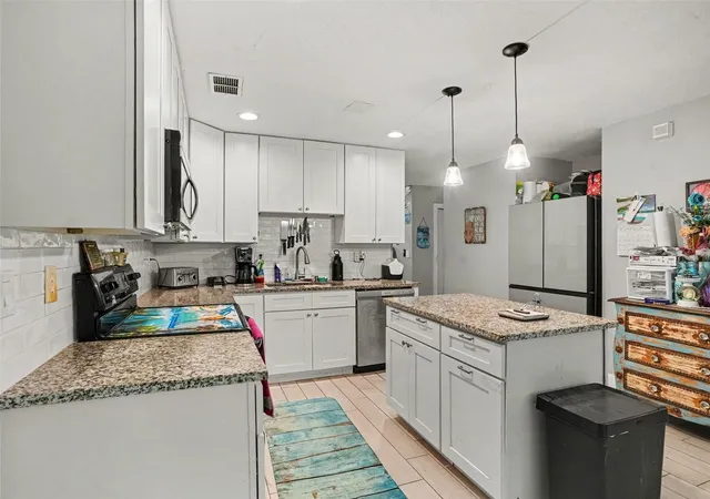 Photo 3 of Single family home for sale at 1306 15th Street SW, Winter Haven, FL 33880 | MLS# TB8547534 | Listing updated on 2026-09-12