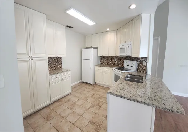 Photo 4 of Single family home for sale at 1306 Coolridge Dr, Brandon, FL 33511 | MLS# TB8547573 | Listing updated on 2026-09-18