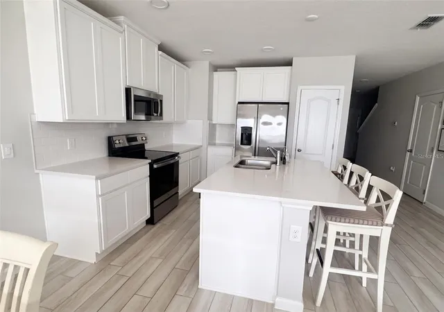Photo 2 of Townhouse for sale at 14917 Harvest St, Orlando, FL 32824 | MLS# O6440928 | Listing updated on 2026-09-19