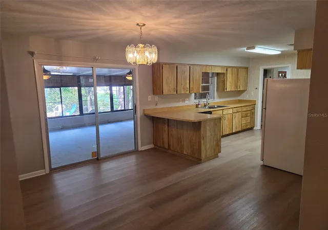 Photo 3 of Single family home for sale at 909 NW 39th Street, Gainesville, FL 32605 | MLS# GC543424 | Listing updated on 2026-09-18