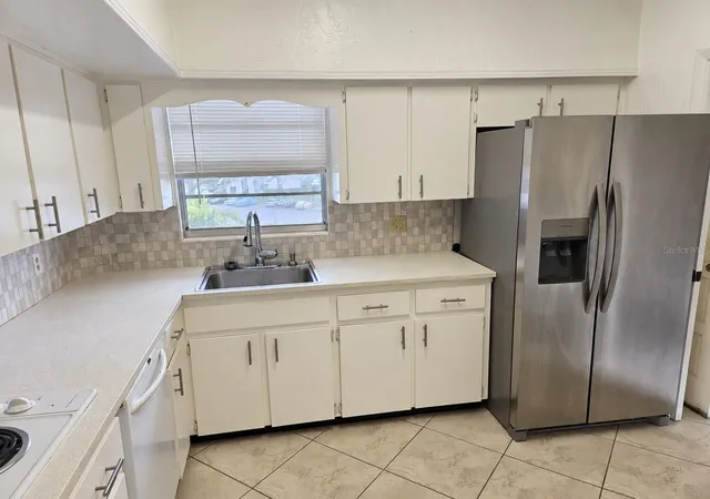 Photo 3 of Condo for sale at 2436 Rhodesian Dr #48, Clearwater, FL 33763 | MLS# TB8547611 | Listing updated on 2026-10-09