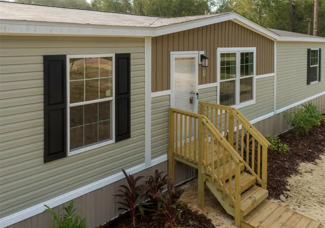 Photo 3 of Manufactured home for sale at 11691 NE 106th Court, Archer, FL 32618 | MLS# GC543428 | Listing updated on 2026-09-29