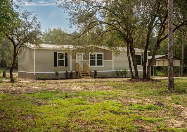 Photo 4 of Manufactured home for sale at 11691 NE 106th Court, Archer, FL 32618 | MLS# GC543428 | Listing updated on 2026-09-29
