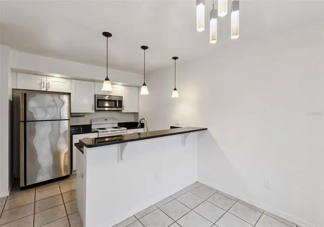 Photo 3 of Condo for sale at 2383 Sun Valley Cir #2383, Winter Park, FL 32792 | MLS# O6440965 | Listing updated on 2026-09-29