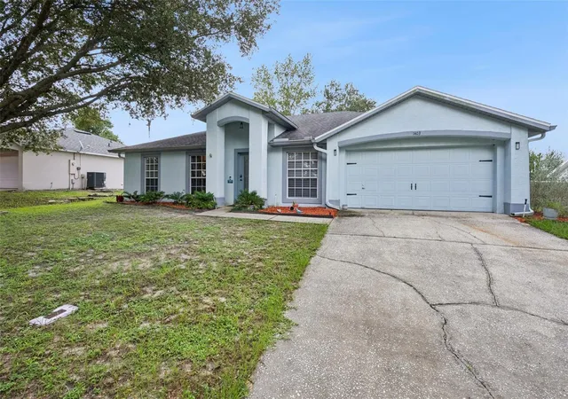 Photo 1 of Single family home for sale at 1403 Brayton Cir, Deltona, FL 32725 | MLS# O6440993 | Listing updated on 2026-09-16