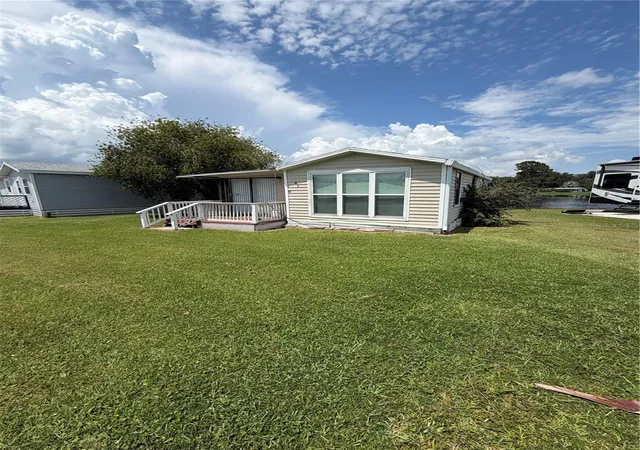 Photo 1 of Manufactured home for sale at 41 Eagle Point N, Osteen, FL 32764 | MLS# O6440998 | Listing updated on 2026-09-12
