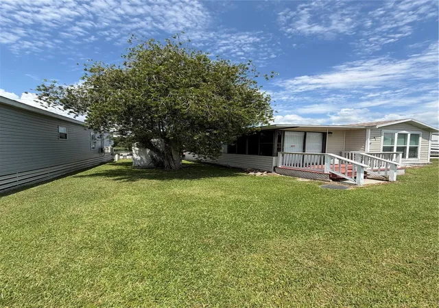 Photo 2 of Manufactured home for sale at 41 Eagle Point N, Osteen, FL 32764 | MLS# O6440998 | Listing updated on 2026-09-12