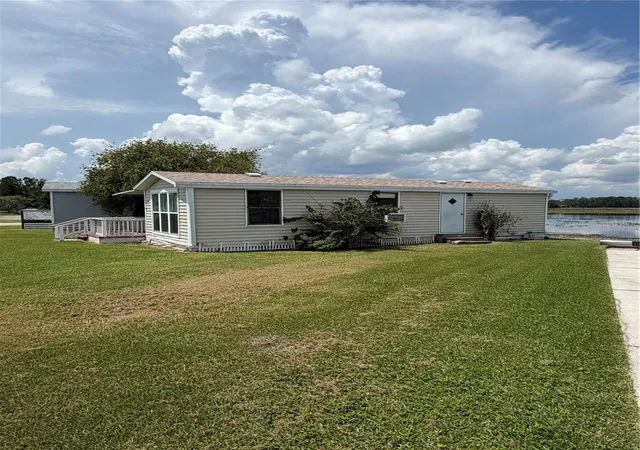 Photo 3 of Manufactured home for sale at 41 Eagle Point N, Osteen, FL 32764 | MLS# O6440998 | Listing updated on 2026-09-12
