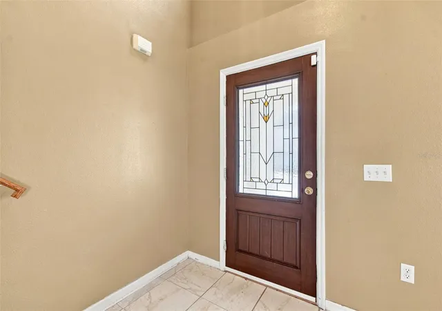 Photo 4 of Single family home for sale at 5155 Spanish Oaks Dr, Lakeland, FL 33805 | MLS# TB8547692 | Listing updated on 2026-09-12