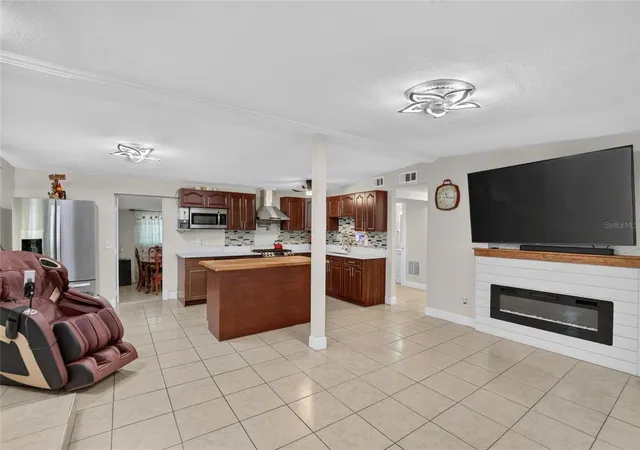 Photo 4 of Single family home for sale at 1727 Waikiki Way, Tampa, FL 33619 | MLS# TB8547700 | Listing updated on 2026-10-22