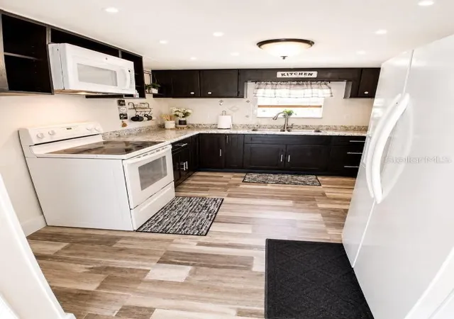 Photo 4 of Manufactured home for sale at 6626 NW 60th Court, Ocala, FL 34482 | MLS# O6441053 | Listing updated on 2026-09-21