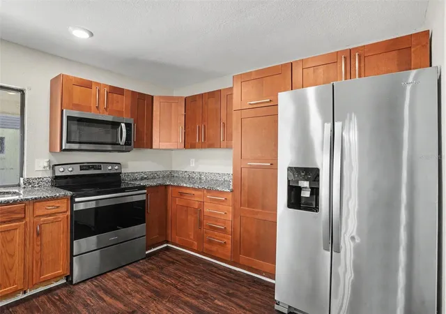 Photo 4 of Single family home for sale at 815 E Flag Ln, Kissimmee, FL 34759 | MLS# O6441071 | Listing updated on 2026-09-16
