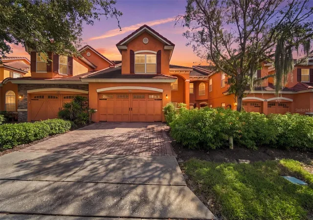Photo 1 of Townhouse for sale at 6956 Sorrento St #6956, Orlando, FL 32819 | MLS# O6441110 | Listing updated on 2026-09-12