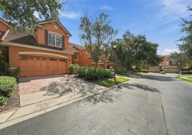 Photo 2 of Townhouse for sale at 6956 Sorrento St #6956, Orlando, FL 32819 | MLS# O6441110 | Listing updated on 2026-09-12
