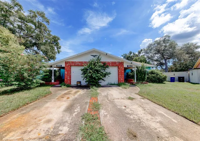 Photo 1 of Multi family home for sale at 3015 St John Dr, Clearwater, FL 33759 | MLS# TB8547805 | Listing updated on 2026-09-14