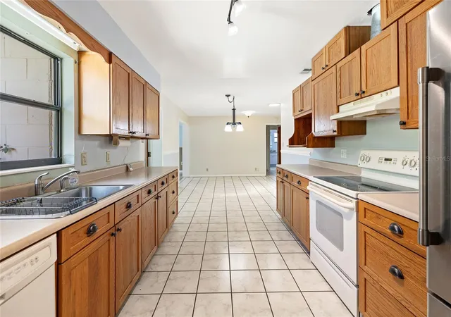 Photo 3 of Single family home for sale at 6035 Mary Lynn Ct, Orlando, FL 32807 | MLS# O6441133 | Listing updated on 2026-09-22