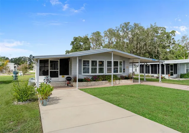 Photo 2 of Manufactured home for sale at 8089 Highpoint Blvd, Brooksville, FL 34613 | MLS# W7889452 | Listing updated on 2026-09-18