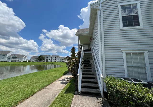 Listing Photo 1 - Condo for sale in building located at 1213 Bermuda Lakes Ln, Kissimmee, FL 34741 - Unit #208