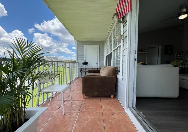 Listing Photo 3 - Condo for sale in building located at 1213 Bermuda Lakes Ln, Kissimmee, FL 34741 - Unit #208
