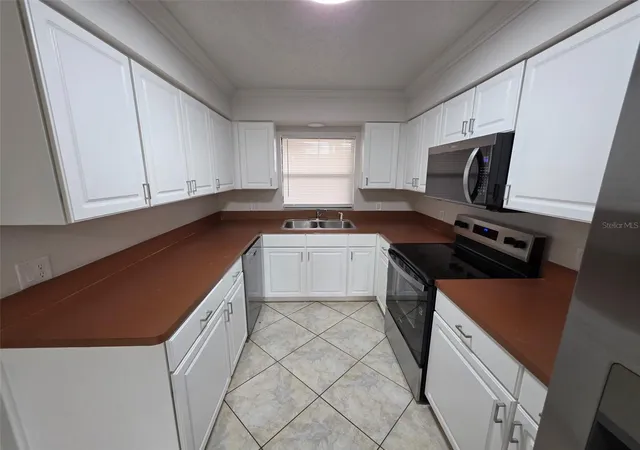 Photo 4 of Condo for sale at 7400 Spring Hl Dr #113, Spring Hill, FL 34606 | MLS# W7889454 | Listing updated on 2026-10-10