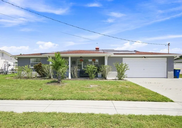 Photo 3 of Single family home for sale at 1324 Chancellor Dr, Holiday, FL 34690 | MLS# TB8547859 | Listing updated on 2026-10-03