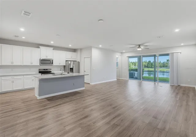 Photo 3 of Townhouse for sale at 10260 Blue Pond, Lutz, FL 33558 | MLS# W7889460 | Listing updated on 2026-09-12