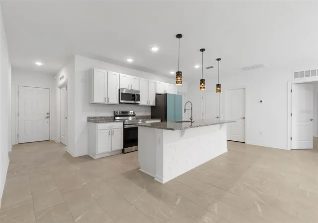 Photo 3 of Single family home for sale at 24 Beacon Ml Ln, Palm Coast, FL 32137 | MLS# FC321405 | Listing updated on 2026-09-12